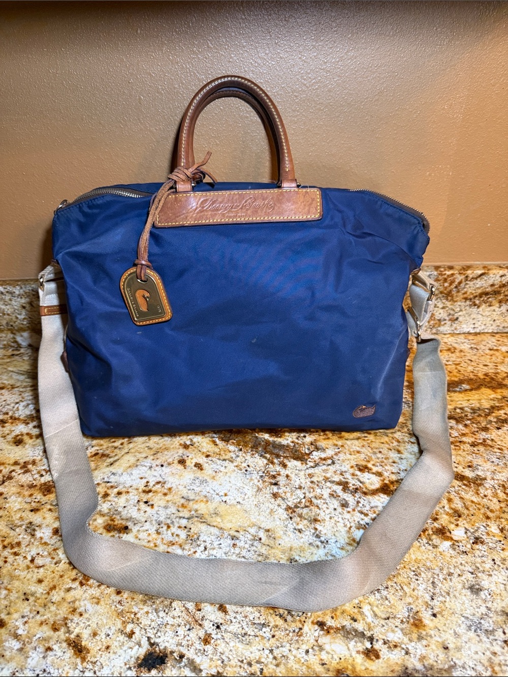 Dooney & Bourke Navy Nylon Messenger Bag with Tan Leather Trim